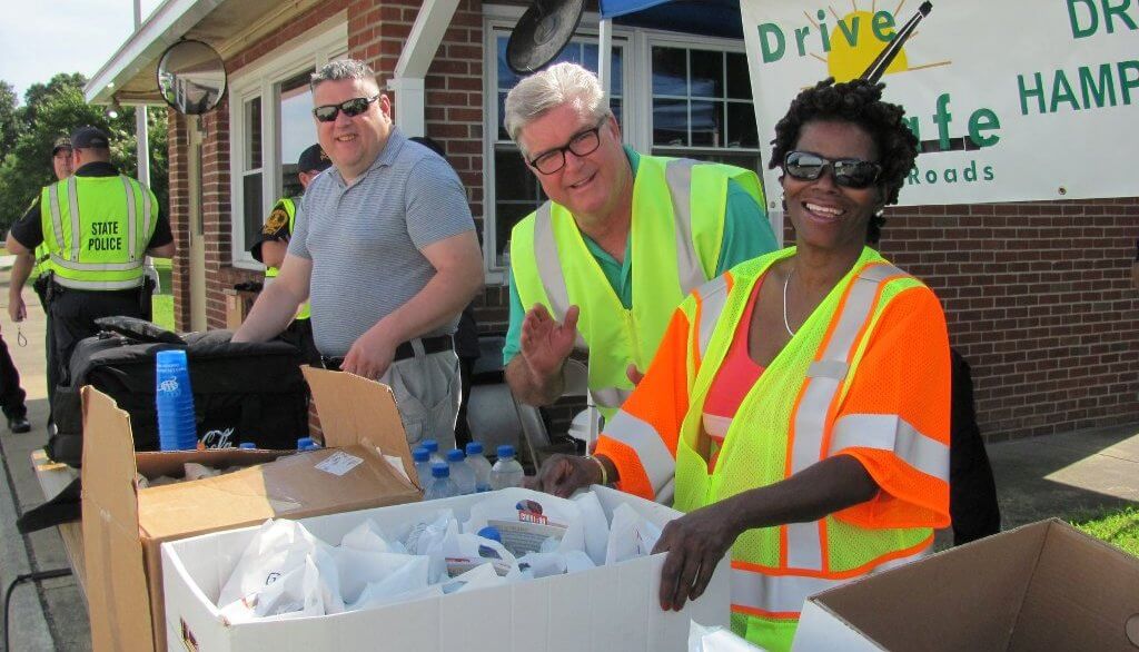 Volunteers pack bags for Annual CMV DAD
